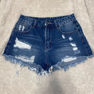 Distressed denim jean shorts